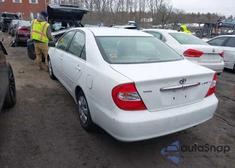 2003 Toyota Camry Le z USA, uszkodzony, nr VIN 4T1BE32K13U134101